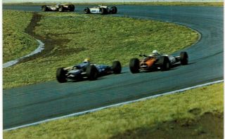 Indy Car Speeding Cars At Turn Indy 500 1960