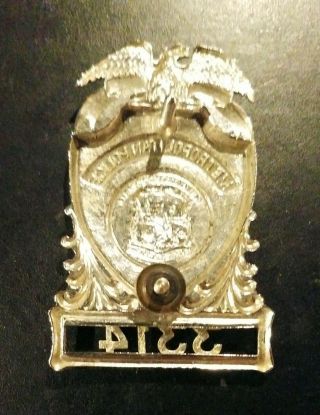 Washington D.  C.  Metropolitan Police hat badge obsolete 2