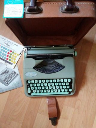 Offering.  Hermes Rocket Vintage Typewriter With Case & Booklet.