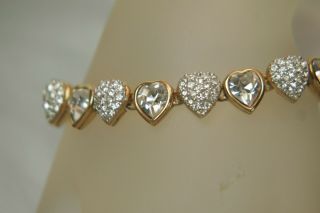 Swarovski Signed Gold Tone Bracelet With Clear Crystals Hearts Discontued