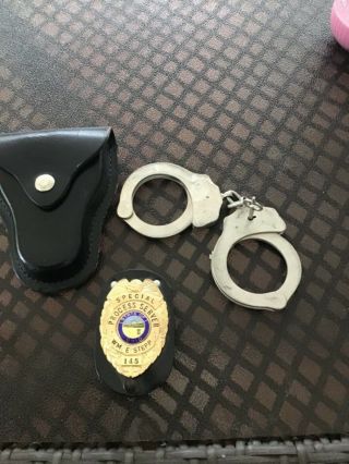State Of Ohio Special Process Server Badge And Handcuffs