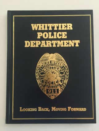 1999 Whittier Police Department Historical Overview - Badge/gun/patch