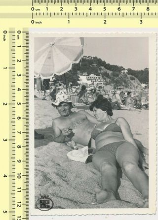 009 Couple On Beach,  Hairy Chest Man W Hat & Bikini Woman On Beach Old Photo