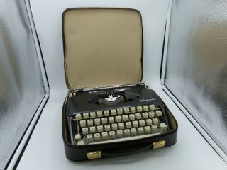 Vintage Olympia Portable Typewriter With Case