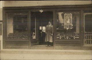Storefront Store Man In Doorway Theatre Poster For Lambert Hall In Window Rppc