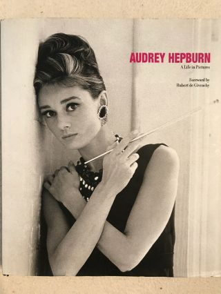 “Audrey Hepburn: A Life In Pictures” (2007) And Audrey Hepburn Canvass Print 4