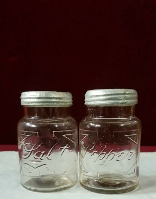 Antique Clear Glass Cursive Embossed Salt And Pepper Shakers Aluminum Metal Lids