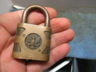 old brass padlock lock with an EAGLE cast on both sides.  n/r 2