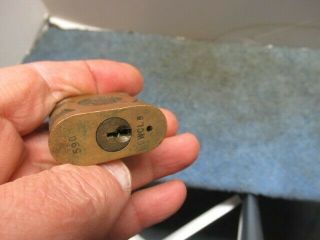 old brass padlock lock with an EAGLE cast on both sides.  n/r 3