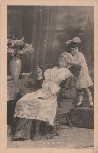 Family Postcard - " Who Is It ?? ".  Little Girl Plays With Grandma/ (vintage)