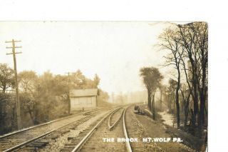 Real Photo Rppc Mt Wolf Pa Railroad Tracks Train Depot Shed ? 2 Men On Right