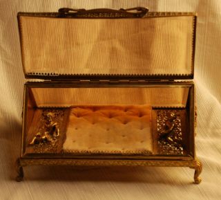 Gilt Metal And Beveled Glass Cupid Display Case