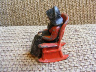 Cast Iron Amish Woman In Rocking Chair Salt And Pepper Shaker