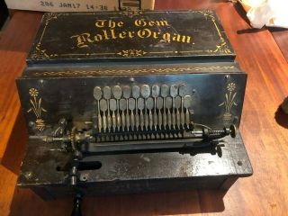 The Gem Roller Organ With 9 Cogs Need Minor Repair.