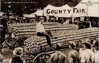 Man Sitting Corn Cob County Fair Exaggerated C1911 W.  Martin Rppc Postcard E35