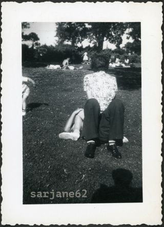 Faceless Woman W/ Back To Camera Sits On Obscured Man In Grass Vintage Photo