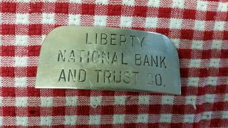 Obsolete - Liberty National Bank And Trust Co.  Hat Badge - Brakmeier Bros.  Louisville