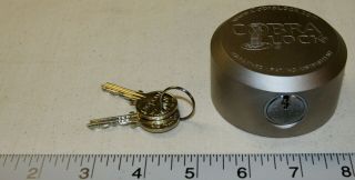 Cobra Puck Lock With A Medeco Inner Cylinder And 2 Keys