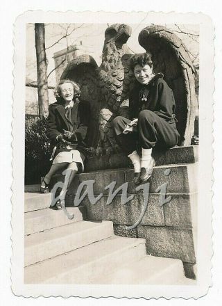 Ladies Sitting In The Wings Of A Big Cement Statue Eagle Old Photo