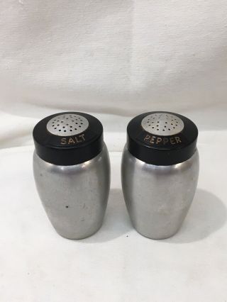 Vintage Kromex Spun Aluminum Salt And Pepper Shakers With Black Top.