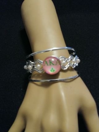 Pink And Green Alpha Kappa Alpha Aka Inspired Bracelet With Pearl Accents.