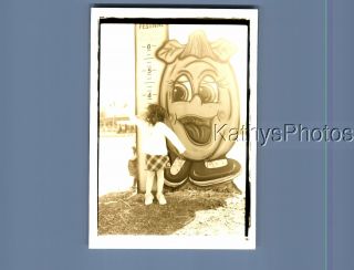 Found B&w Photo N_4113 Girl In Dress Standing By Pumpkin Stand