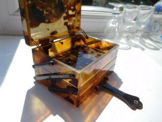 Faux Eastern tortoise shell trinket box with dragon on lid with handle 3 drawers 2