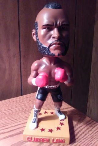 Rare Hollywood Collectables Group Clubber Lang Bobblehead Pre - Owned