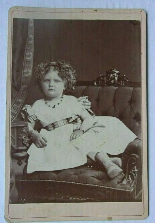 Antique photo cdv cabinet card pretty little girl on tufted chair & ? in back 2