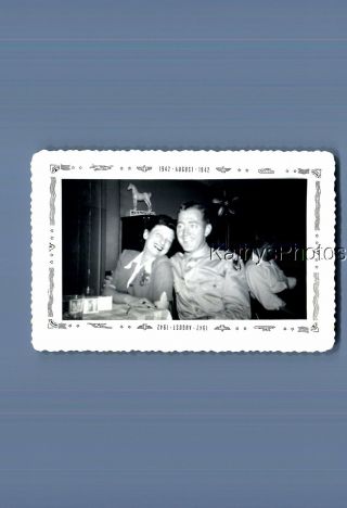 Found B&w Photo F,  4589 Soldier Posed With Arm Around Pretty Woman At Table