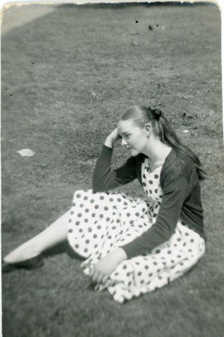 Vintage B/w Snapshot - Pretty Girl In Polka Dot Dress Sitting On The Grass