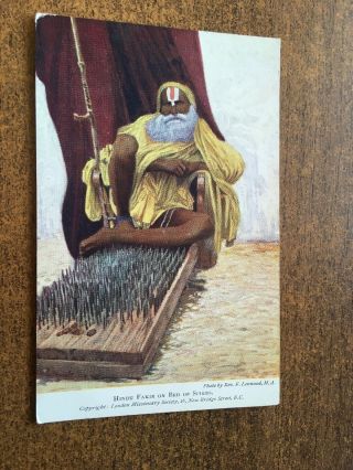 Hindu Fakir On A Bed Of Spikes.  Early London Missionary Society Postcard.