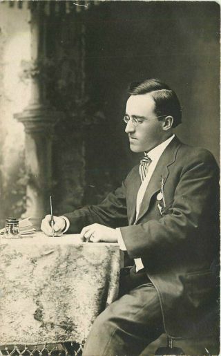 C - 1910 Photo Studio Man Suit Sitting At Table Rppc Photo Postcard 4439