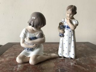 2 Royal Copenhagen Porcelain Figurines " Girl With Doll " 3539 & 1938