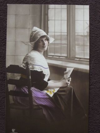 Pretty Lady Wearing Dutch Hat Looking Out Window Vtg Color Tinted Photo Postcard