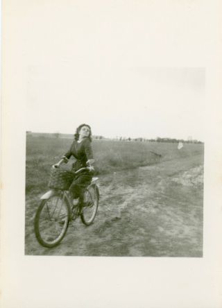 Vintage Snapshot Photo - Girl With Attitude Riding A Bicycle On A Dirt Road