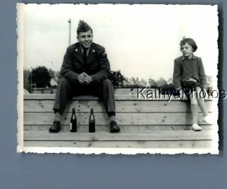 Found B&w Photo A_7728 Soldier Sitting On Wall By Girl In Dress