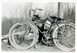 Vintage B/w Photo Of A Young Man With His Head Between Two Bicycles