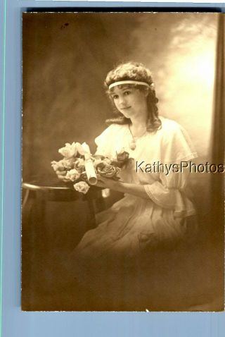 Black & White Photo F,  2133 Pretty Woman In Dress Sitting Holding Flowers