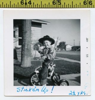 Vintage 1955 Photo / Little Cowboy Rides Tricycle One - Handed While Firing Pistol