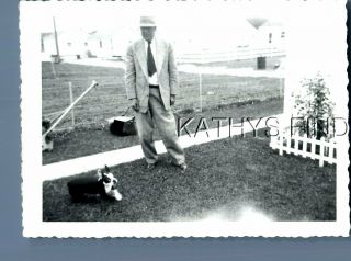 Found B&w Photo M,  4064 Man In Suit And Hat Posed By Small Dog