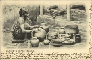 India? Native Woman Cleaning Brass Vessels Singapore Cancel 1904 Postcard