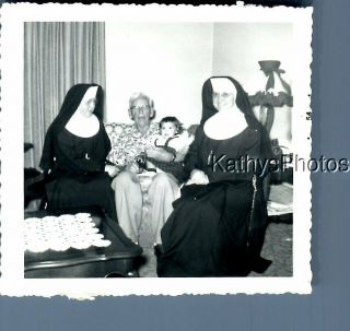 B&w Photo F,  2566 Nuns Sitting By Man Holding Girl