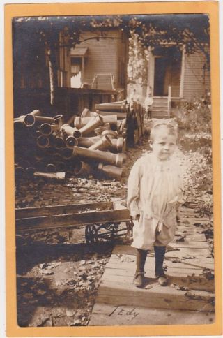 Real Photo Postcard Rppc - Little Boy On Walkway Ceramic Pipes In Yard
