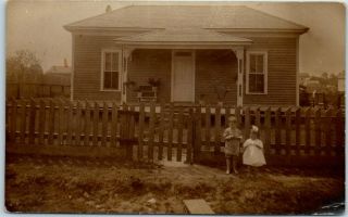 Texas Rppc Real Photo Postcard Boy & Girl In Front Of Small House " Liberty,  Tx "