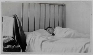 Old Photo Man Sleeping In Metal Frame Bed Clothes And Towel On Chair 1910s