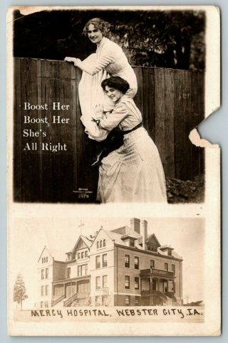 Webster City Iowa Mercy Hospital Gal Gives Friend A Lift Over Fence Rppc 1914