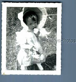 Black & White Photo M_5260 Little Girl In Dress And Hat Holding Easter Basket