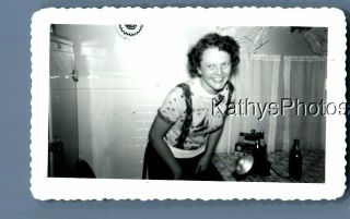 Found B&w Photo C,  4767 Pretty Woman Posed By Table Smiling