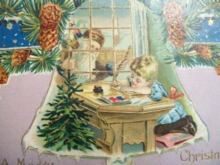 A Marry Christmas Santa With Brown Coat No Gloves Child Writing Letter At Desk